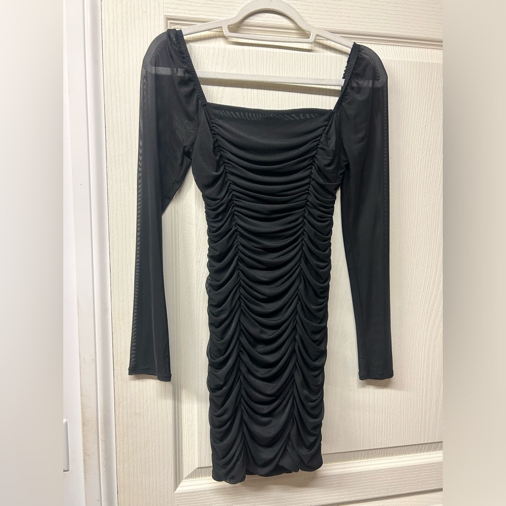Black bodycon dress.